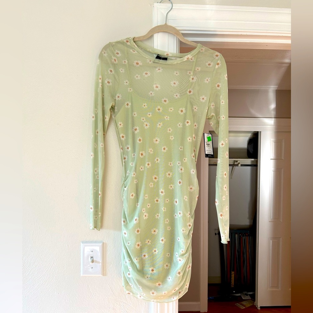 Mesh Volcom Long Sleeve Dress. NEW WITH TAGS